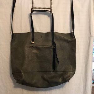 Large leather tote with both shoulder/ cross body strap and handles.